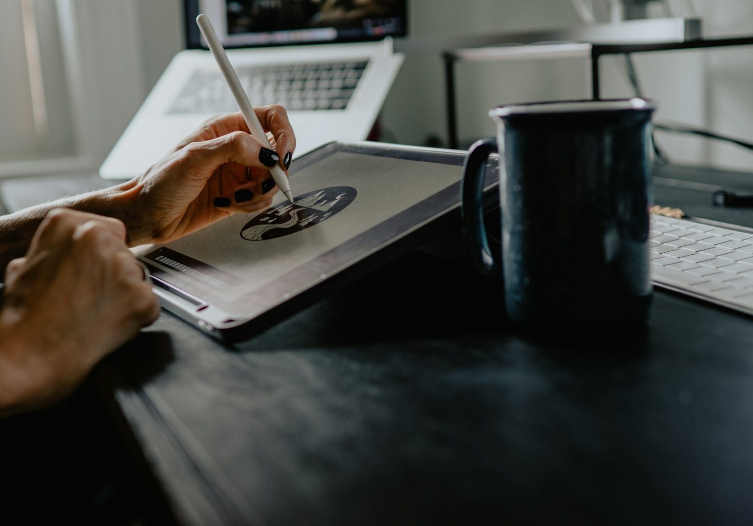 person holding silver fork on white paper